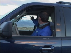 Inyo Sheriff Bill Lutze pointed to the plane crash site at the edge of the dry lake.