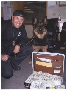 Officer Dan Casabian and his K-9 Brutus on a successful mission.