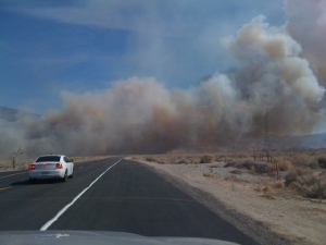 Fire approached Hwy 136.  Photo by Dennis Mattinson.