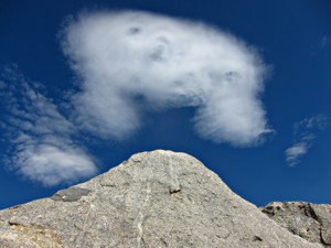 An excited altocumulus cloud leaping over some boulders below Mt. Tom. Photo by Andrew Kirk