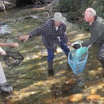  Jeff O’Brien, Robert Atley and Ken Lyndes gathering up the winning ducks at last year’s ducky derby.