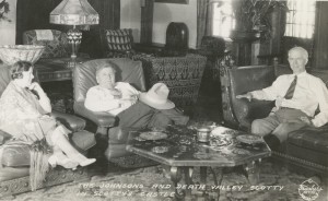 In the living room at Scotty’s Castle are businessman Albert Johnson, right, his wife, left, and Death Valley Scotty. The two men formed an unlikely and very interesting partnership that resulted in the construction of the Castle, and Scotty’s well-publicized exploits in Death Valley. Photo courtesy Eastern California Museum.