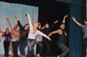 Rehearsing a dance number with choreographers Gigi deJong and Jose Pizana