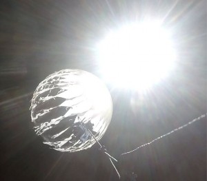 This photograph entitled "pop2" depicts the weather balloon just as it pops. 