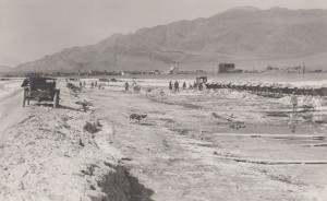 Men working in the evaporation ponds at Natural Soda Products, outside of Keeler, about 1920. Eastern California Museum photo.