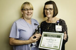 NIHD’s 2016 DAISY Award winner Rhonda Aihara with Acting Chief Nursing Officer Tracy Aspel. Aihara was selected for the honor from a field of 10 nominees. Photo by Barbara Laughon/Northern Inyo Hospital