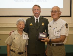 Volunteers Ann and Saburo Sasaki with National Park Service Director Jon Jarvis, August 9, 2016, in Washington, DC. 