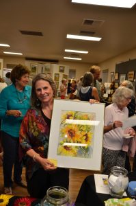 Lynne Peterson donated raffle painting “Sunny Ones”