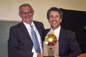 Stacey Brown, MD, right, accepts the Avenue of Excellence Award from Northern Inyo Hospital Foundation Board Chairman Ken Partridge. Brown was named as the inaugural Physician of the Year. Photo by Gayla Wolf/The Honey Bee 