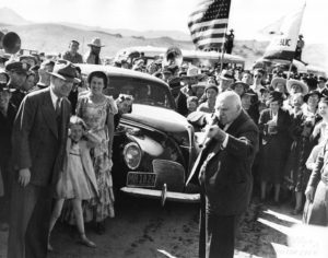 California Gov Merriam fires a shotgun to mark the opening of the new Lone Pine to Death Valley road courtesy ECM