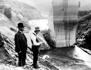 William Mulholland and his assistant Van Norman inspect all that reamins after the St. Francis Dam collapsed in March of 1928.