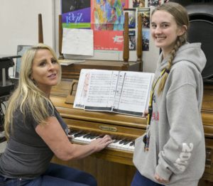 Maryanne Schat as Donna and Abby Stoiber as Sophie rehearsing for Mamma Mia