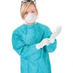 nurse in surgical gown and mask