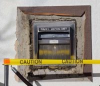 bank night drop deposit box vandalized